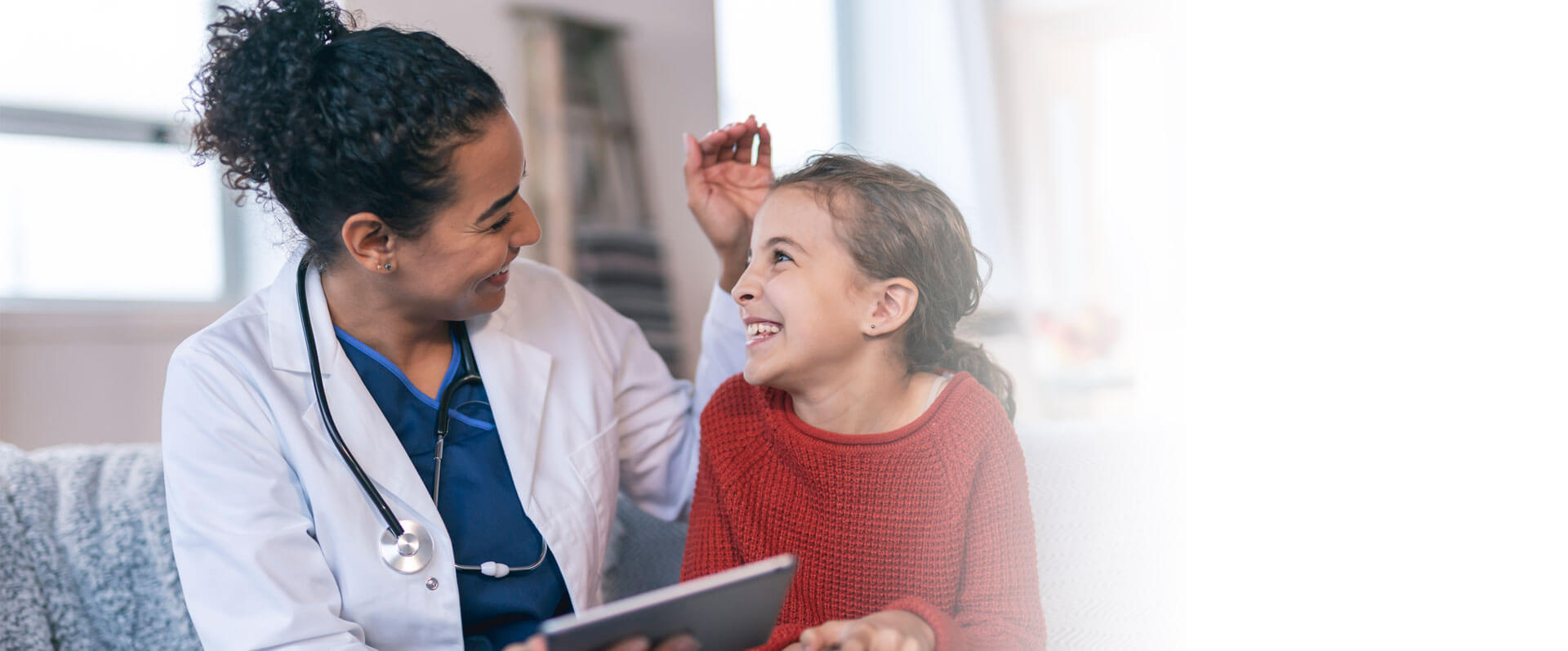 pediatrician smiling at patient